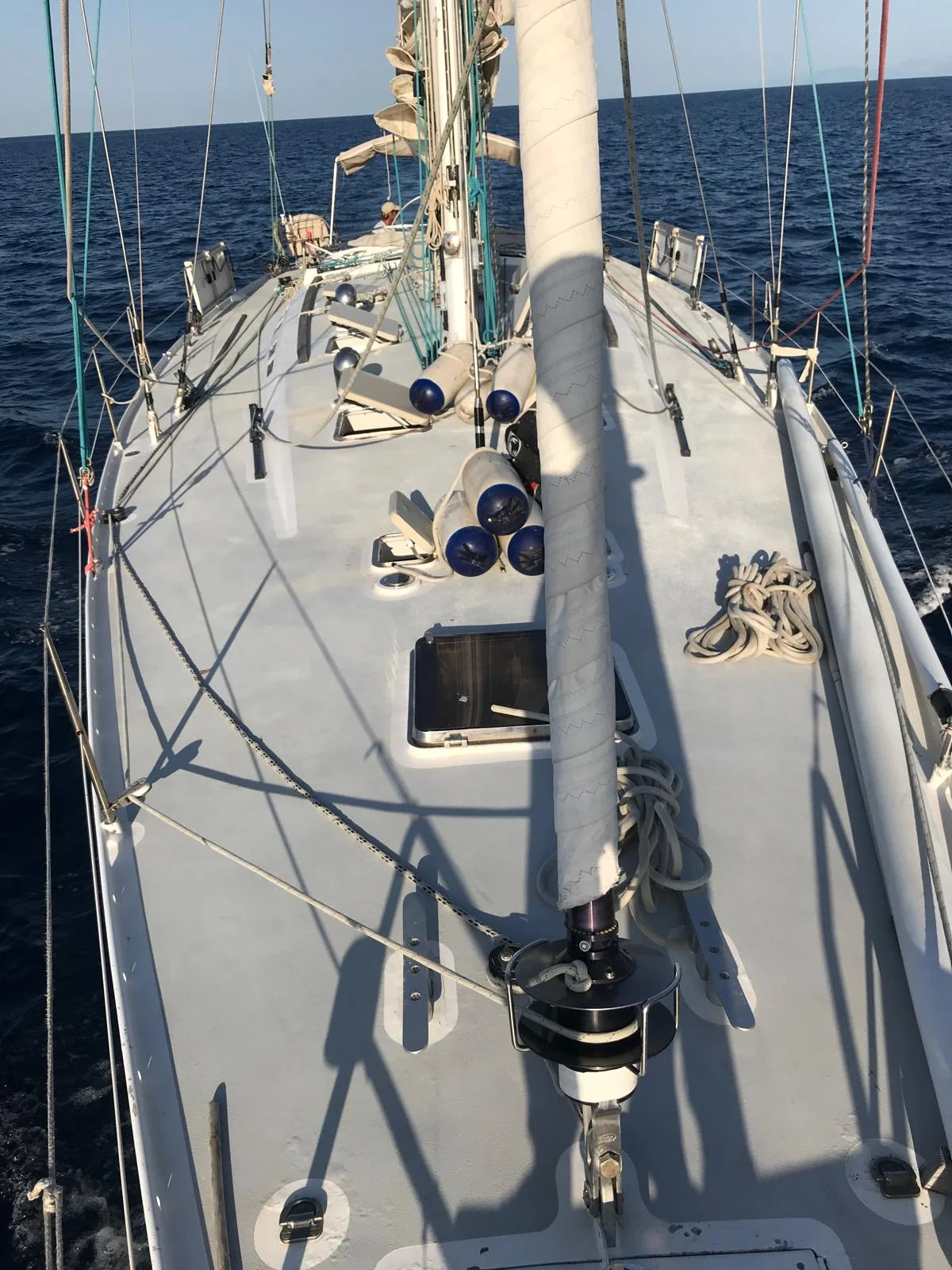 ZORYA foredeck looking forward from the mast, fenders and coiled lines on deck